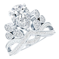 Vintage inspired moissanite engagement ring featuring a large central stone set in a detailed band by Rosec Jewels.