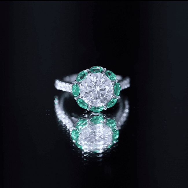 Certified 3 Carat Moissanite engagement ring with emerald accents by Rosec Jewels, showcasing a sparkling, elegant design.