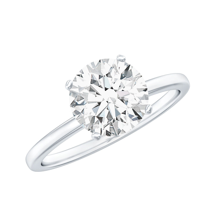 Round 2 carat moissanite solitaire engagement ring with a sleek band, crafted by Rosec Jewels.