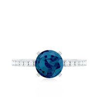 1.3 Carat Round London Blue Topaz Solitaire Ring with Diamond Side Stones