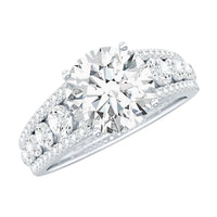 Round Brilliant Cut Moissanite Side Stone Engagement Ring