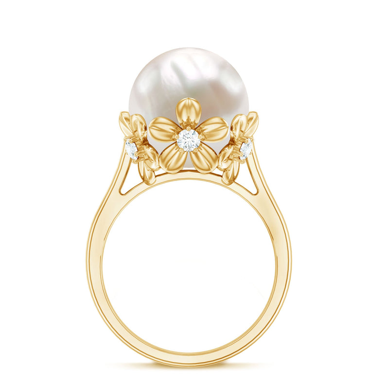 Rosec Jewels 11 Carat freshwater pearl flower engagement ring with diamond, featuring intricate floral design on a silver band.