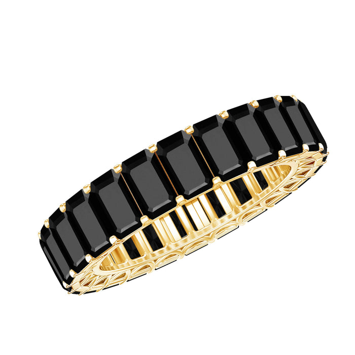 Emerald cut black spinel eternity ring by Rosec Jewels featuring a continuous row of sparkling black spinel gemstones.