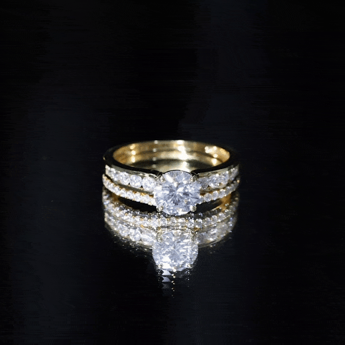 Certified 2 Carat Moissanite engagement ring with matching wedding band by Rosec Jewels, showcasing sparkling gemstone and elegant design.