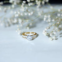 Certified 2 Carat round moissanite engagement ring with matching wedding band from Rosec Jewels, showcasing sparkling gemstone and elegant design.