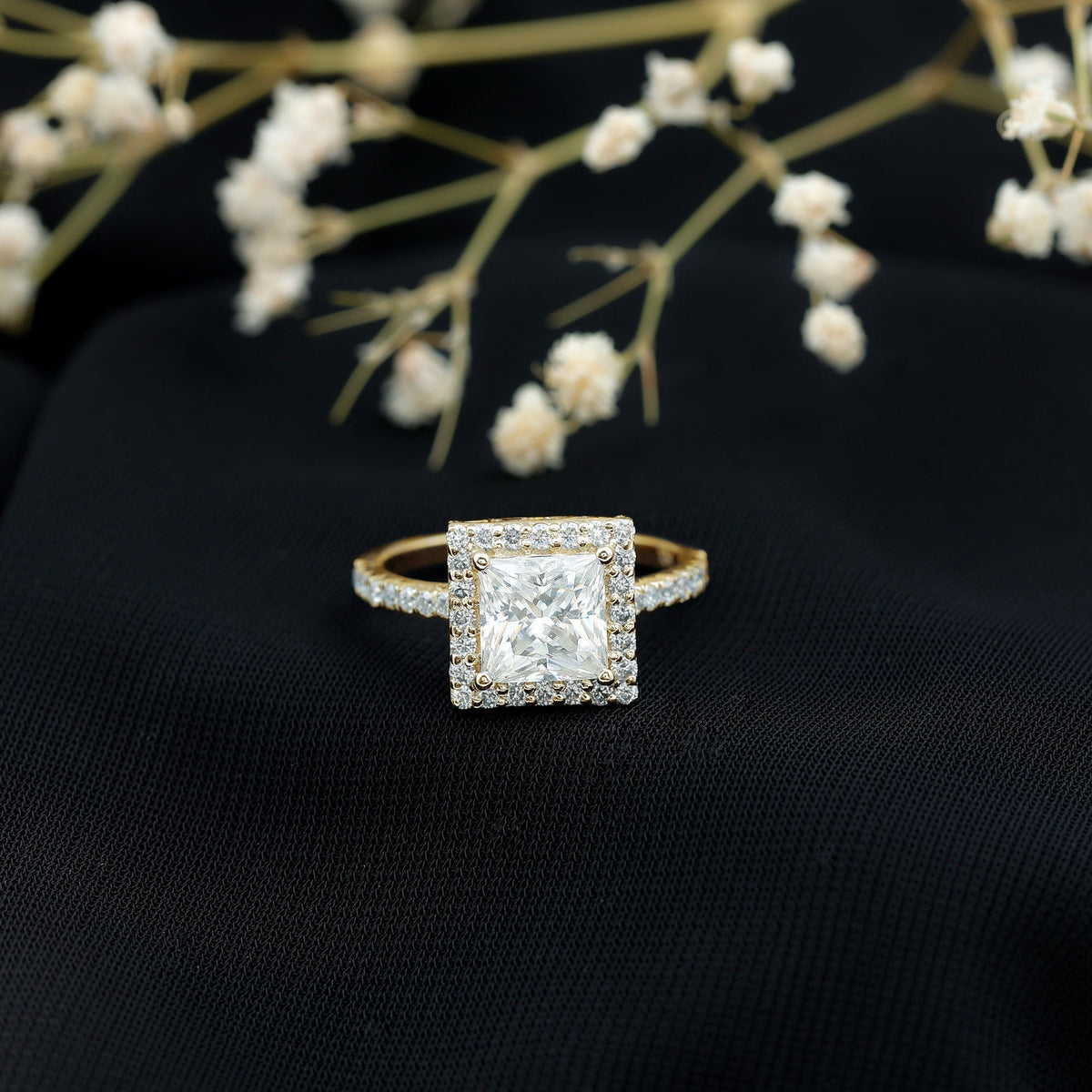 Three-carat princess cut moissanite halo engagement ring by Rosec Jewels featuring a sparkling central stone and intricate halo design.