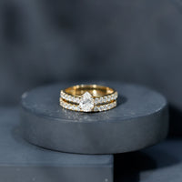 Pear Shaped Moissanite Engagement Ring with Wedding Band