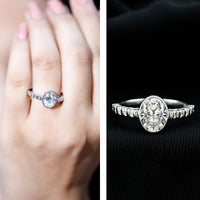 Bezel Set Moissanite Oval Engagement Ring with Side Stones