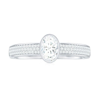 Oval Cut Moissanite Side Stone Engagement Ring in Bezel Setting