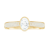Oval Cut Moissanite Side Stone Engagement Ring in Bezel Setting
