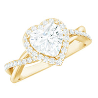 Heart-shaped moissanite halo engagement ring with criss-cross band by Rosec Jewels, featuring sparkling stones and intricate band design.