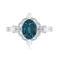 Art Deco Inspired Blue Topaz Oval Engagement Ring with Diamond