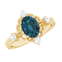 Art Deco Inspired Blue Topaz Oval Engagement Ring with Diamond