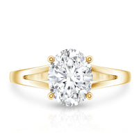 Oval cut moissanite solitaire engagement ring with split shank design from Rosec Jewels, showcasing the elegant ring on a white background.