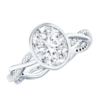 Brilliant cut moissanite engagement ring with bezel setting and braided shank by Rosec Jewels, showcasing the detailed design and sparkle.