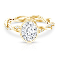 Brilliant cut moissanite engagement ring with bezel setting and braided shank by Rosec Jewels, showcasing the detailed design.