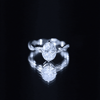 Moissanite Oval Engagement Ring With Diagonal Prong Setting