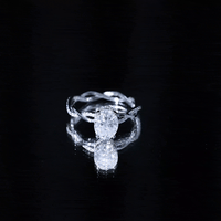 Yellow gold Moissanite hidden halo engagement ring with infinity shank from Rosec Jewels, featuring sparkling stones and elegant design.