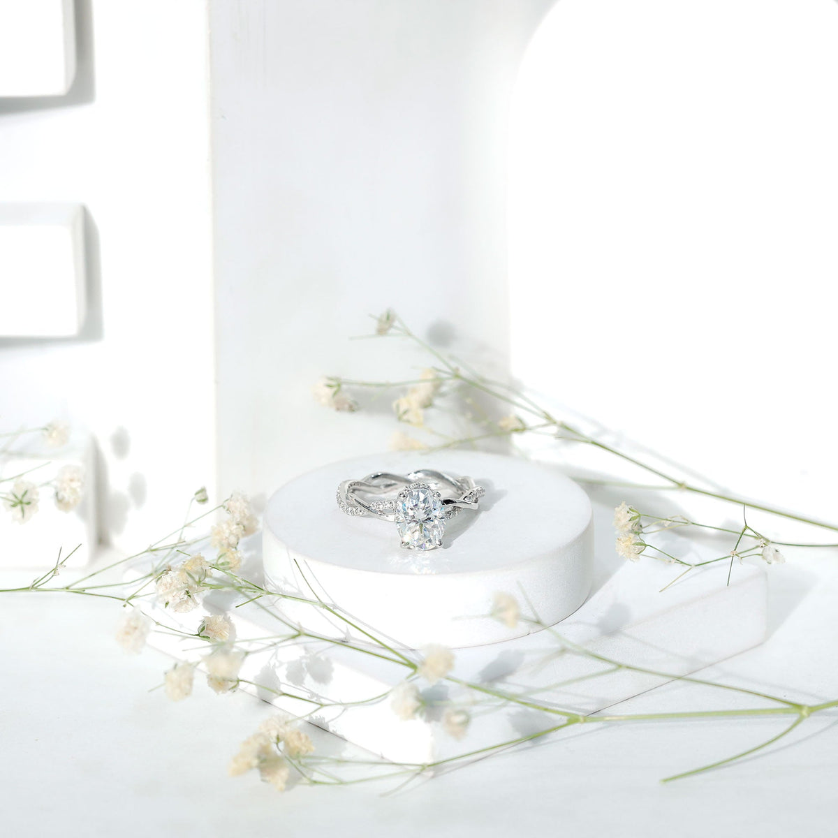 Moissanite hidden halo engagement ring with infinity shank by Rosec Jewels, showcasing sparkling center stone and elegant band.