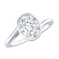 Solitaire 2 Carat Moissanite engagement ring with bezel setting and bypass shank by Rosec Jewels, shown from a side angle.