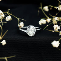 Solitaire 2 Carat Moissanite engagement ring by Rosec Jewels featuring bezel setting and bypass shank design.