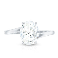 Oval cut solitaire moissanite bypass engagement ring with sleek band from Rosec Jewels, showcasing a sparkling center stone.