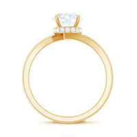 Oval cut solitaire moissanite bypass engagement ring from Rosec Jewels featuring a sleek, modern design in sterling silver.