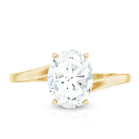 Oval cut solitaire moissanite bypass engagement ring by Rosec Jewels featuring a sleek, elegant design and sparkling gemstone centerpiece.