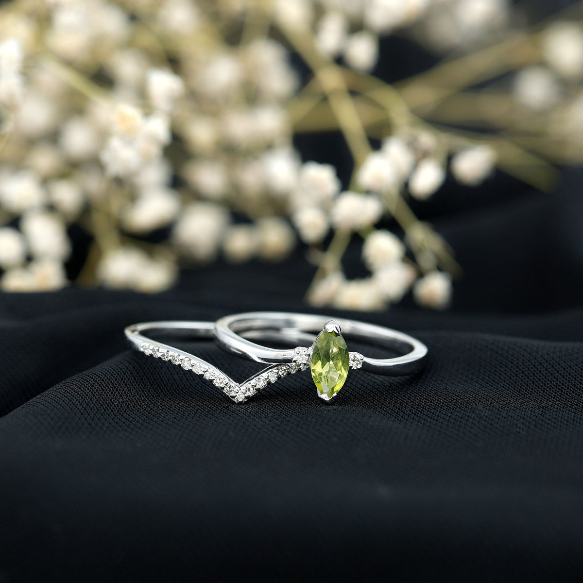 Marquise cut Peridot solitaire wedding ring set with diamond accents from Rosec Jewels, displayed on a white background.