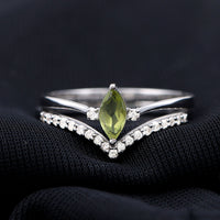 Marquise cut peridot solitaire wedding ring set with diamond accents, featuring Rosec Jewels' elegant ring design.