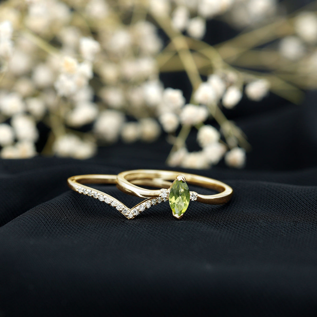 Marquise cut peridot solitaire wedding ring set with diamond accents by Rosec Jewels, featuring a sleek gold band and elegant design.