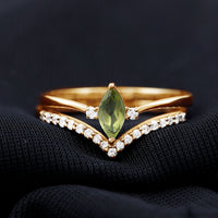 Marquise cut Peridot solitaire wedding ring set with diamond accents, featuring a rose gold band and elegant design by Rosec Jewels.