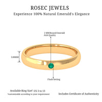 Natural May birthstone emerald band ring from Rosec Jewels featuring a polished green emerald set in a sleek gold band.