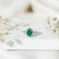 Real 0.7 Carat Oval Emerald Engagement Ring with Diamond Halo