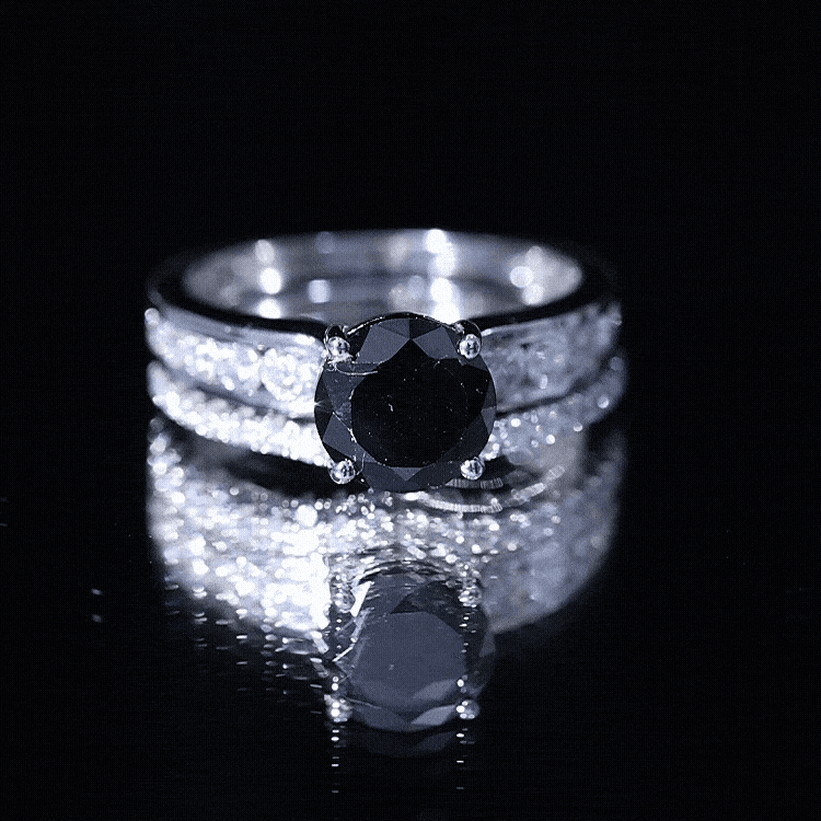 Yellow gold 2 carat lab-grown black diamond engagement ring with moissanite enhancer by Rosec Jewels.