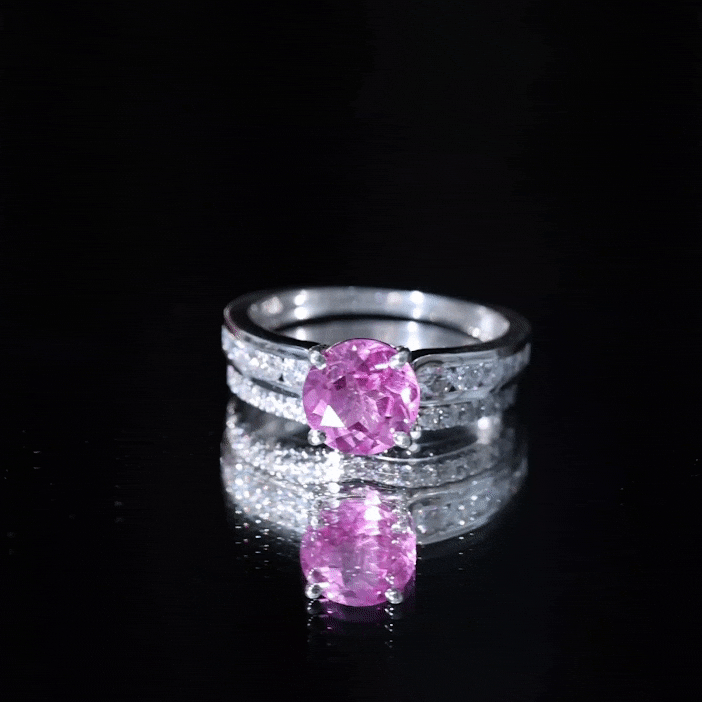 Two 2.25 carat lab-grown pink sapphire solitaire bridal rings set with yellow gold bands by Rosec Jewels.