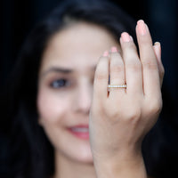 Rosec Jewels princess cut cubic zirconia eternity wedding band ring with certificate, featuring sparkling stones and a sleek design.