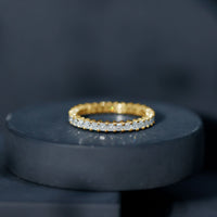 Rosec Jewels princess cut cubic zirconia eternity wedding band ring with sparkling stones and certificate visible in the image.