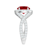 Round created ruby crossover engagement ring with moissanite by Rosec Jewels, showcasing the elegant ruby and sparkling stones.