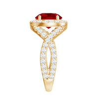 Round created ruby crossover engagement ring with moissanite, featuring a sleek gold band and intricate design by Rosec Jewels.