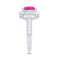 Lab-created pink sapphire vintage engagement ring with diamond halo, featuring intricate metalwork and sparkling stones.