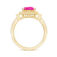 Vintage pink sapphire engagement ring with diamond halo from Rosec Jewels, featuring a lab-created pink sapphire centerpiece.