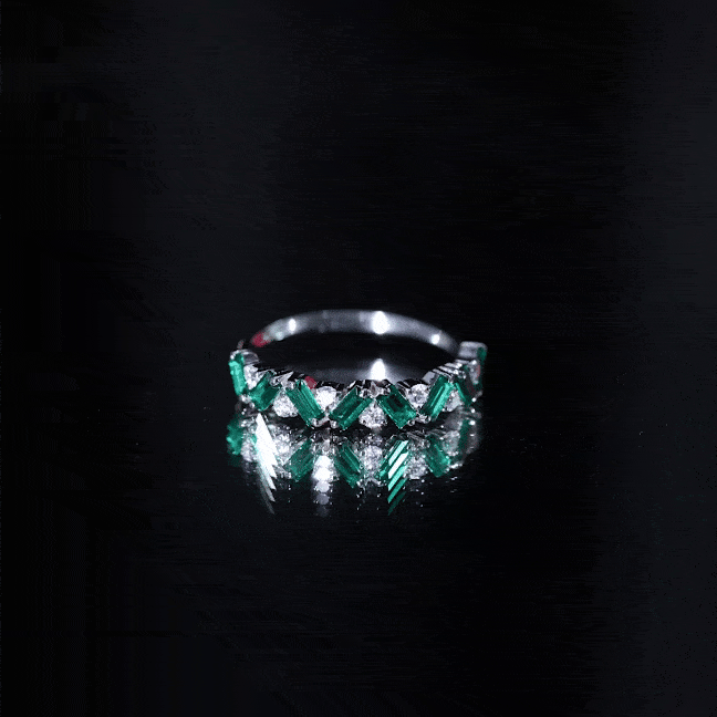 Yellow gold lab-grown emerald and diamond half eternity ring with baguette shapes from Rosec Jewels.