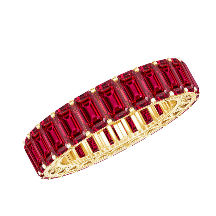 Emerald cut lab-grown ruby eternity wide band ring by Rosec Jewels, featuring a row of sparkling ruby stones on a sleek gold band.