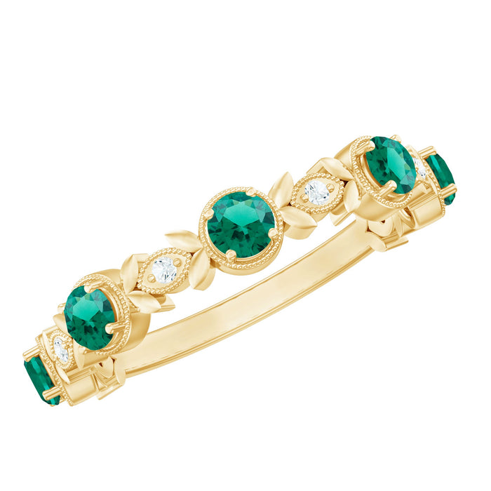 Nature-inspired lab-grown emerald and diamond half eternity ring by Rosec Jewels, featuring a floral design and sparkling gemstones.
