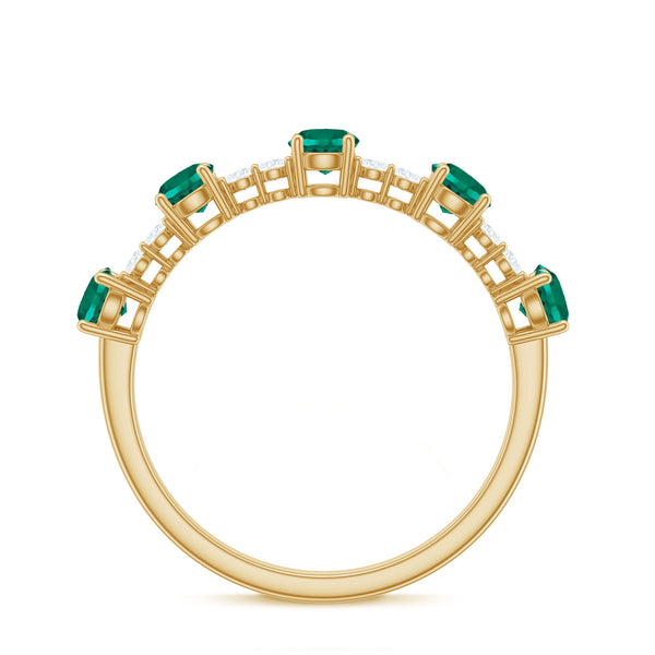 Certified lab-grown emerald half eternity ring with diamonds from Rosec Jewels, showcasing green emeralds and sparkling diamonds on a band.