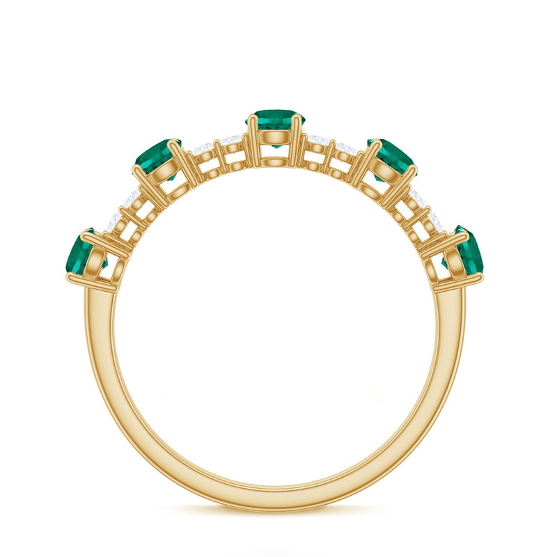 Certified lab-grown emerald half eternity ring with diamonds from Rosec Jewels, showcasing green emeralds and sparkling diamonds on a band.