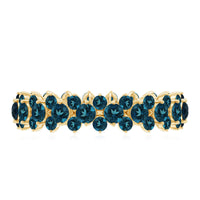Rosec Jewels London Blue Topaz cluster eternity band ring with sparkling blue gemstones and silver band.