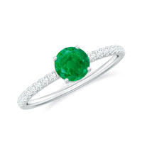 Natural emerald promise ring with diamond side stones, featuring a classic design from Rosec Jewels.