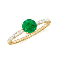 Natural emerald promise ring by Rosec Jewels featuring diamond side stones and a polished gold band.